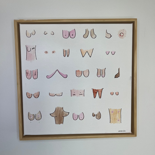 Framed artwork with various abstract shapes on a white background